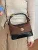 Yuezizhi 2026 principios de otoño nueva moda bolso versátil bolsa para lonchera bolso de cadena estilo vintage bolso cruzado tipo cubo esmerilado