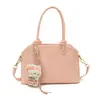 Bolso de mujer de alta gama de nicho 2026 nueva versión coreana bolso de hombro cruzado simple y elegante bolso de mano de gran capacidad moderno