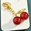 Venta Directa de Fábrica Personalizada Llavero de Cereza Colgante para Bolso Accesorios para Bolsos de Mujer Llavero de Coche Exquisito Venta Caliente Transfronteriza