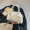 Bolso Boston portátil de cara brillante con nuevo diseño de nicho para mujer de este año 2025, bolso bandolera de hombro combinable.