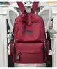 Mochila transfronteiriça de novo estilo para estudantes do ensino fundamental II e médio, com estampa, grande capacidade, estilo casual e um visual simples com tingimento degradê.