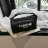 Bolsa de cosméticos de grande capacidade nova transfronteiriça feminina portátil de alto padrão celebridade da internet viagem lona portátil lavagem bolsa de armazenamento
