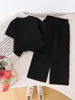 Suministro Transfronterizo de Ropa para Niños, Ropa para Niños Europeos y Americanos, Ropa para Niñas, Conjunto de Camiseta Negra de Manga Corta + Pantalones para Bebés