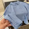 Otoño 2026 Nuevo Estilo Coreano Moda Solapa Raya Vertical Manga Larga Camisa Mujer Holgada Adelgazante Versátil Top Ropa Exterior