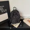 Mochila Pequeña para Mujer 2026 Nuevo Modelo de Primavera, Mochila de Viaje Ligera y Elegante, Bolso de Commuter de Nicho de Moda
