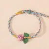 2026 Novo Modelo Pulseira de Flor Rosa Iridescente Ajustável Fashionável Versátil Corda Trançada Multicolorida Corda de Segurança para Pulseira