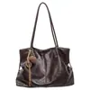 Bolsa tote vintage de grande capacidade para o dia a dia de mulheres, novo modelo outono 2026, bolsa de ombro casual estilosa e moderna estilo coreano
