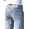 Jeans de seda gelada masculino de Hong Kong, fino para primavera e verão, corte slim, perna reta, elástico de oxigênio gelado, calça longa casual de cor clara para primavera e outono