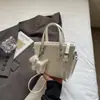 Bolsas Pequenas de Nicho Coreanas para Mulheres Verão 2025 Nova Bolsa Transversal de Aparência Sofisticada, Bolsa de Balde Portátil Popular deste Ano