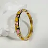 Yongge Jewelry Pulsera de Esmalte Transfronteriza Europea y Americana para Mujer Moderna Colorida Geométrica Rayada de Puntos Filigrana con Borde Dorado Accesorio de Mano