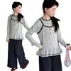 Conjunto de Ropa de Primavera para Niñas 2026 Nuevo Elegante Estilo Coreano Conjunto de Camiseta de Manga Larga en Capas y Pantalones de Pierna Ancha para Niños Mayores