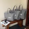 Nova Bolsa de Mão Não Tecida com Zíper Loja de Roupas Bolsa Grande de Alta Capacidade Espessada Atacado Presente Bolsa de Compras Verde
