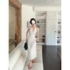Vestido blanco de lunares con escote en V para mujer, estilo francés de verano, sexy, sin espalda, elegante, falda de longitud media