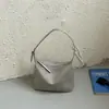Bolso hobo de cuero suave tejido estilo coreano, modelo nuevo 2026, simple y versátil para el trabajo, bolso de mano y bolso de hombro de moda