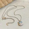 Pendientes de Zirconia Súper Brillantes con Lazo Moda Fresca de Verano Dulce Collar Conjunto de Joyería de Gama Alta de Nicho para Mujeres
