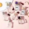 Botellas de Perfume de Vidrio Transparente en Stock al por Mayor, Botellas de Muestra de Vidrio Portátiles, Botellas con Atomizador de Presión, Botellas Vacías Recargables para Perfume
