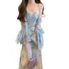 Vestido Azul Floral de Suspensório Estilo Francês de Luxo para Mulheres, Verão 2026, com Conjunto de Duas Peças com Cardigã de Ar Condicionado com Proteção Solar
