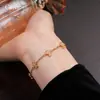 Pulsera Cruz de Circonita Minimalista Francesa Electrochapada en Oro Real, Lujo Ligero, Sensación de Alta Gama, Moderna, Joyería Exquisita y Versátil