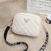 Bolso de mujer nuevo de rombos con borla, bolso cuadrado pequeño, bolso de hombro cruzado, bolso de cámara de moda con lazo, bolso pequeño transfronterizo, moda