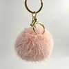 Lindo Nutria Conejo Piel Pompón Pequeño Llavero Colgante Ins Celebridad de Internet Peluche Bola Pequeña de Carbón Colgante para Mochila Bolso Adorno Regalo