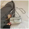 Bolso de mano pequeño vintage estilo coreano para mujer, nuevo modelo de verano 2026, bolso de hombro simple y texturizado para el uso diario, bolso cruzado
