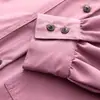 Ropa de mujer al por mayor transfronteriza 2026 otoño nuevo estilo europeo y americano versátil nicho manga larga cuello alto corte holgado camisa de trabajo