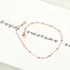 Estilo Japonés y K de Acero de Titanio Cuentas de Transferencia Tobilleras de Oro Rosa para Mujeres Temperamento Simple y Versátil Accesorios Personalizados Venta al por Mayor