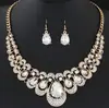 Conjunto de colar e brincos de metal com brilho de diamante e gema, temperamento fashion europeu e americano (gotas de agua) 9115