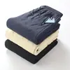Kaitai Factory Stock Disponible L-XL Nuevos Pantalones de Cachemira para Hombre Otoño e Invierno Forro Polar y Engrosados Ropa de Abrigo Resistente al Viento Invierno