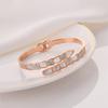 Pulsera de moda de hueso de serpiente con concha del mismo estilo transfronterizo, pulsera abierta de acero de titanio, joyería personalizada elegante de estilo frío para mujer