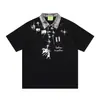 Savagebase Camiseta Polo Estampado de Dibujos Animados Splash Callejero Americano Verano 2026 Cuadros Empalmados Mangas Cortas