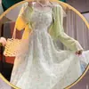 Traje de vestido floral suave de longitud media para mujer, nuevo cárdigan fino de verano con protección solar, dulce falda de tirantes