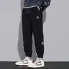 Calça de Moletom Esportiva Masculina 2025 Novo Estilo Outono e Inverno Acolchoada com Lã Calça Casual Espessa Calça de Veludo Masculina Quente de Inverno