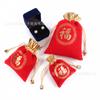 Lugar de fábrica Bolsita de la suerte dorada de Año Nuevo con cordón, base roja de terciopelo, borde con cordón, bolsa para dulces y bocadillos de Año Nuevo