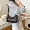 Bolso de Axila con Estampado de Piedra para Mujer 2026 Nuevo Otoño Popular Nicho Súper Caliente Exquisito Para el Trabajo Bolso de Hombro Único Cruzado