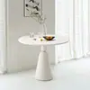 Juego de mesa redonda color crema estilo francés para apartamentos pequeños, con tablero y sillas de losa de roca, adecuado para recepción de lujo ligero, reuniones y uso en balcón