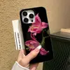 Elegante Funda Negra de Lirio para Teléfono Adecuada para iPhone 17 Pro, Apple 16/15, Funda Protectora Anti-Caídas de Cobertura Total Al Por Mayor