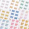 Venta caliente transfronteriza Resina Aurora linda joyería para uñas Parpadeante Lazo Funda para teléfono Decoraciones para uñas