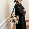 La bolsa popular de este año 2023 nueva moda en línea popular bolsa tote para mujer gran capacidad Bolso de hombro de lona para mujer
