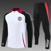 Venta Caliente de Fábrica Conjunto de Uniforme de Fútbol Deportivo Versión de Jugador del Manchester United Traje de Chaqueta de Fútbol de Invierno Chaqueta de Partido de Uniforme de Fútbol