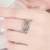 Anillo de compromiso de oro rosa con microincrustaciones de circonitas, joyería de moda, venta directa.