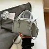 Bolsa de mão Boston transfronteiriça para mulheres, nova bolsa transversal versátil de verão 2026, bolsa de ombro casual de nicho para mulheres
