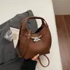 2026 Nova Bolsa Saco Estilo Coreano Nicho Retrô Simples Bolsa de Ombro Casual Estilosa Bolsa de Mão Feminina Tendência para o Trabalho
