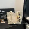 Bolso tote tejido de estilo sencillo para mujer, nueva colección 2026, bolso de hombro de gran capacidad, bolso de mano elegante y versátil
