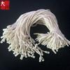 Etiqueta de ropa cuerda de algodón colgante grano mayoreo cuerda colgante universal etiqueta bala de alta gama cuerda de mano cuerda de algodón fabricantes de Yiwu