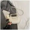 Bolsa de Mão Tendência Estilo Coreano com Formato de Dumpling para Mulheres, Novo Modelo Primavera 2026, Alto Valor Estético, Sensação Única e Relaxada, Bolsa de Ombro Único Transversal