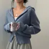 Chaqueta suéter con capucha de doble cremallera corta chic coreana para mujer 2026 estilo suave color liso prenda exterior de punto