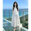 Conjunto de Dos Piezas Estilo Suave: Chaleco Blanco sin Mangas y Falda Larga de Cintura Alta - Nuevo Conjunto de Verano 2026 Delgado y Elegante