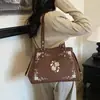 Bolsa de axila em camurça com padrão bordado para mulheres, apresentando design de trevo de quatro folhas e nota musical, estilo hobo retrô, grande capacidade, bolsa de ombro e bolsa transversal