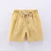 Pantalones cortos de niño hot pants 2020 nuevos de algodón y lino estilo coreano casual de verano modernos deportivos moda precio de fábrica al por mayor